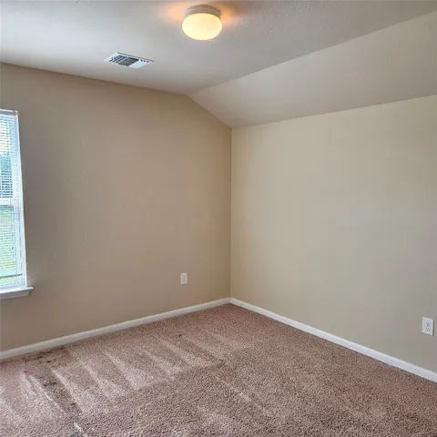 wooden floor and window in a room