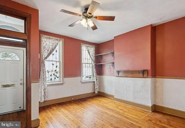 803 North 5th Street Philadelphia, PA 19123 - Photo 4 of 19 a view of empty room with wooden floor and fan