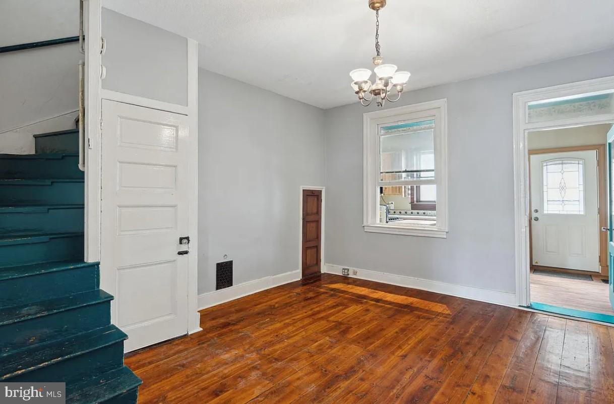 803 North 5th Street Philadelphia, PA 19123 - Photo 5 of 19 a view of a hallway with front door and wooden floor