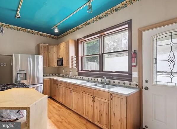 803 North 5th Street Philadelphia, PA 19123 - Photo 6 of 19 a bathroom with a granite countertop sink and a large mirror