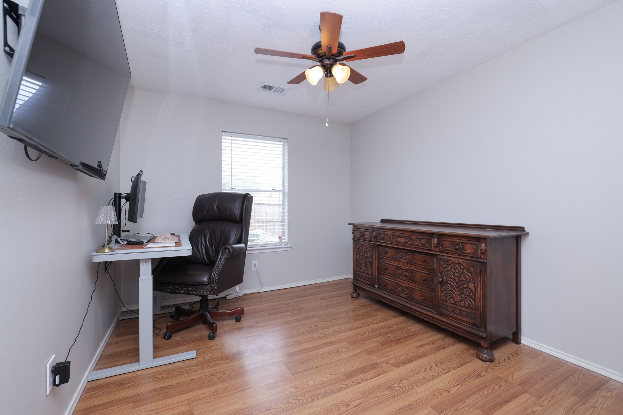 3803 Oaklace Drive Spring, TX 77389 - Photo 11 of 36 a living room with furniture and a wooden floor