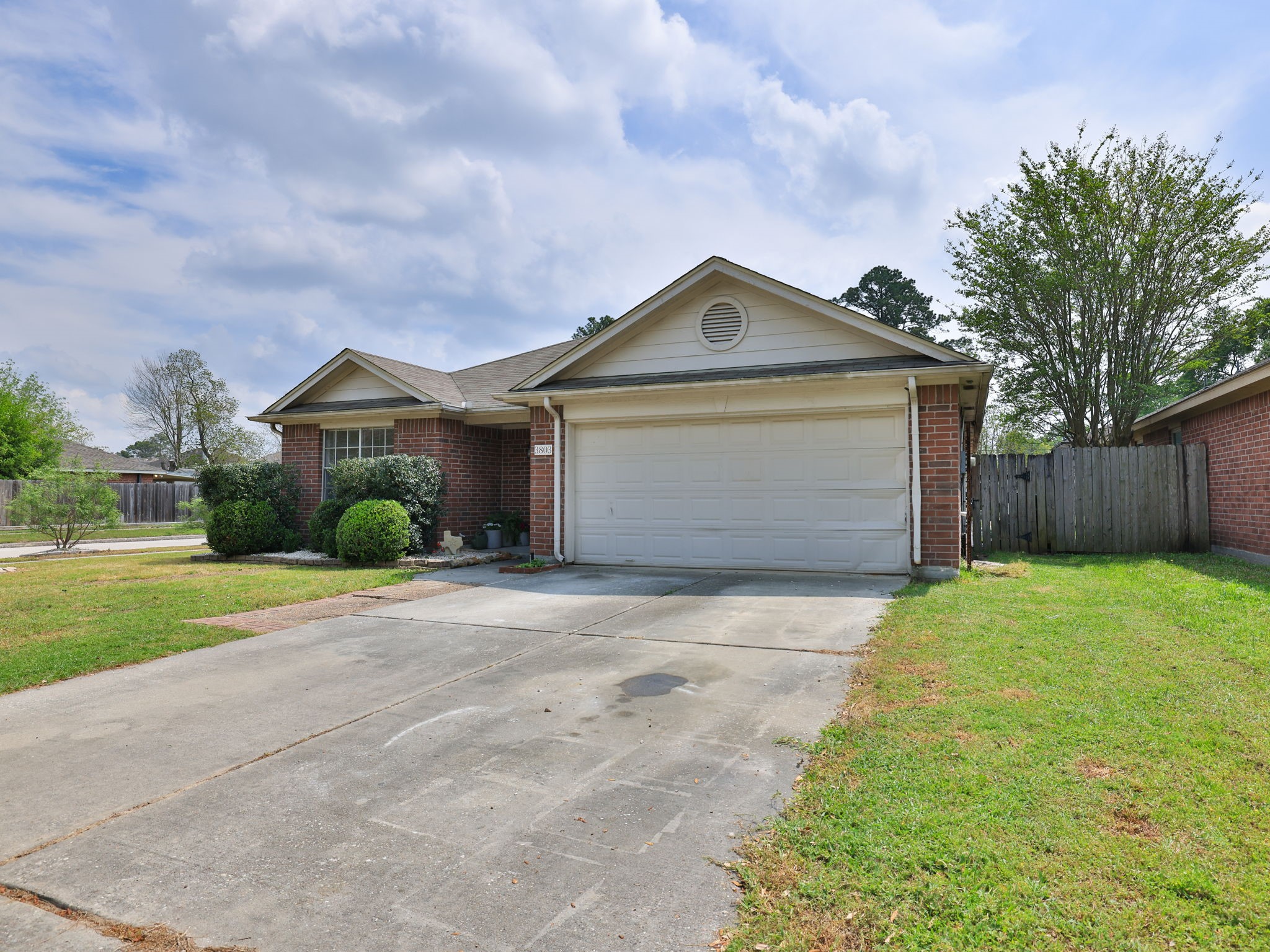 3803 Oaklace Drive Spring, TX 77389 - Photo 2 of 36 a front view of a house with a yard and garage