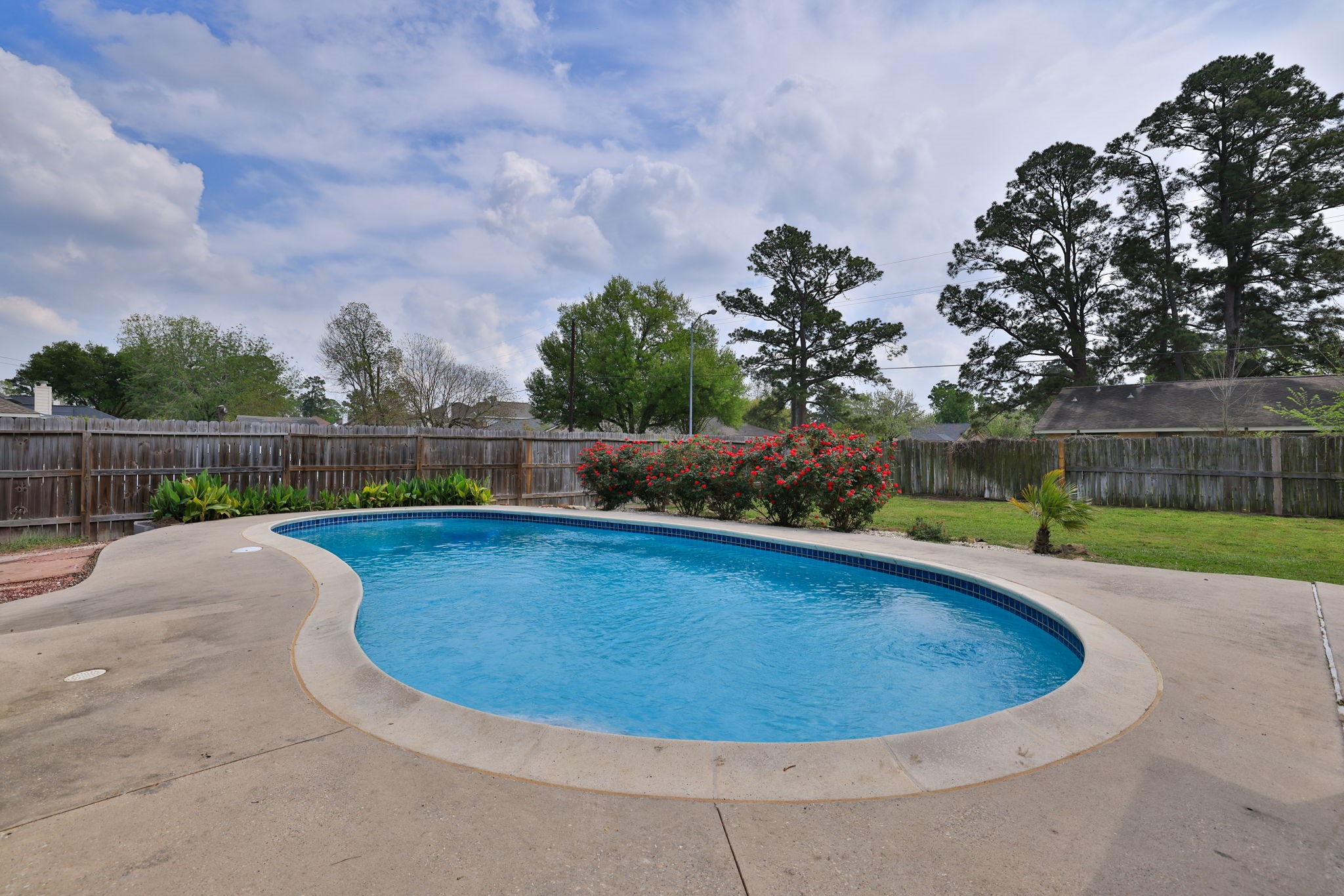 3803 Oaklace Drive Spring, TX 77389 - Photo 29 of 36 a view of a swimming pool with a yard