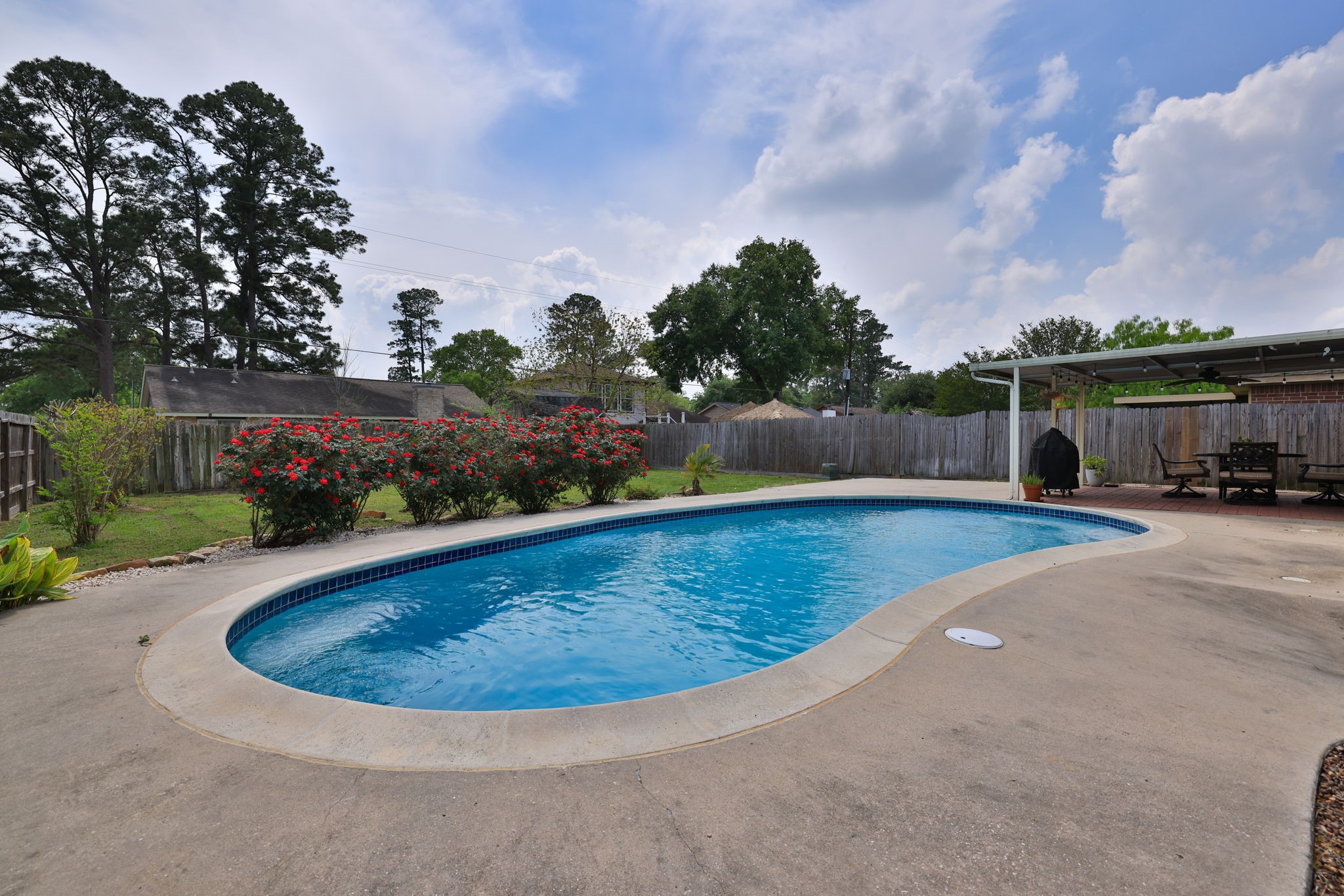3803 Oaklace Drive Spring, TX 77389 - Photo 31 of 36 a view of a swimming pool with a yard
