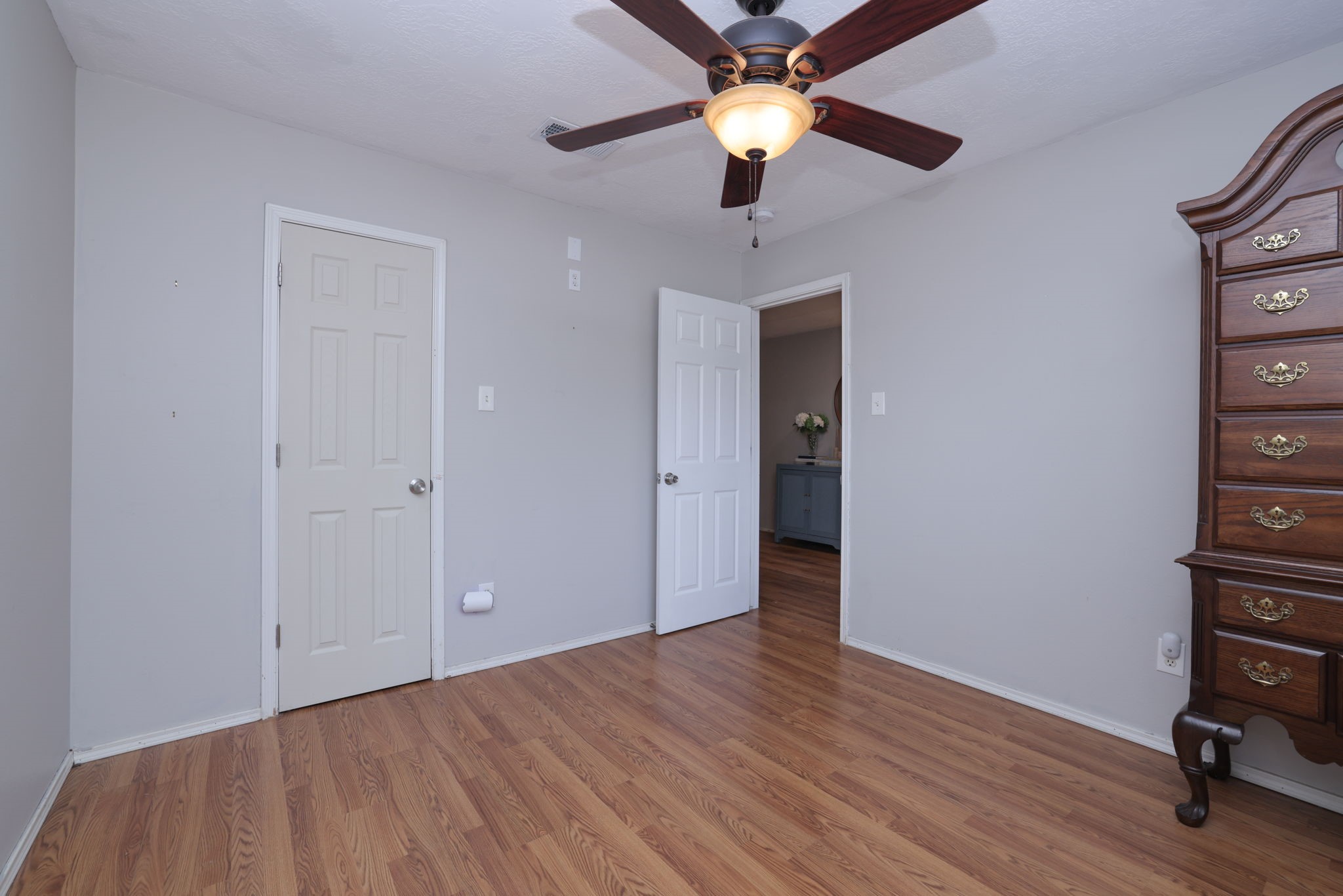 3803 Oaklace Drive Spring, TX 77389 - Photo 8 of 36 an empty room with wooden floor and windows