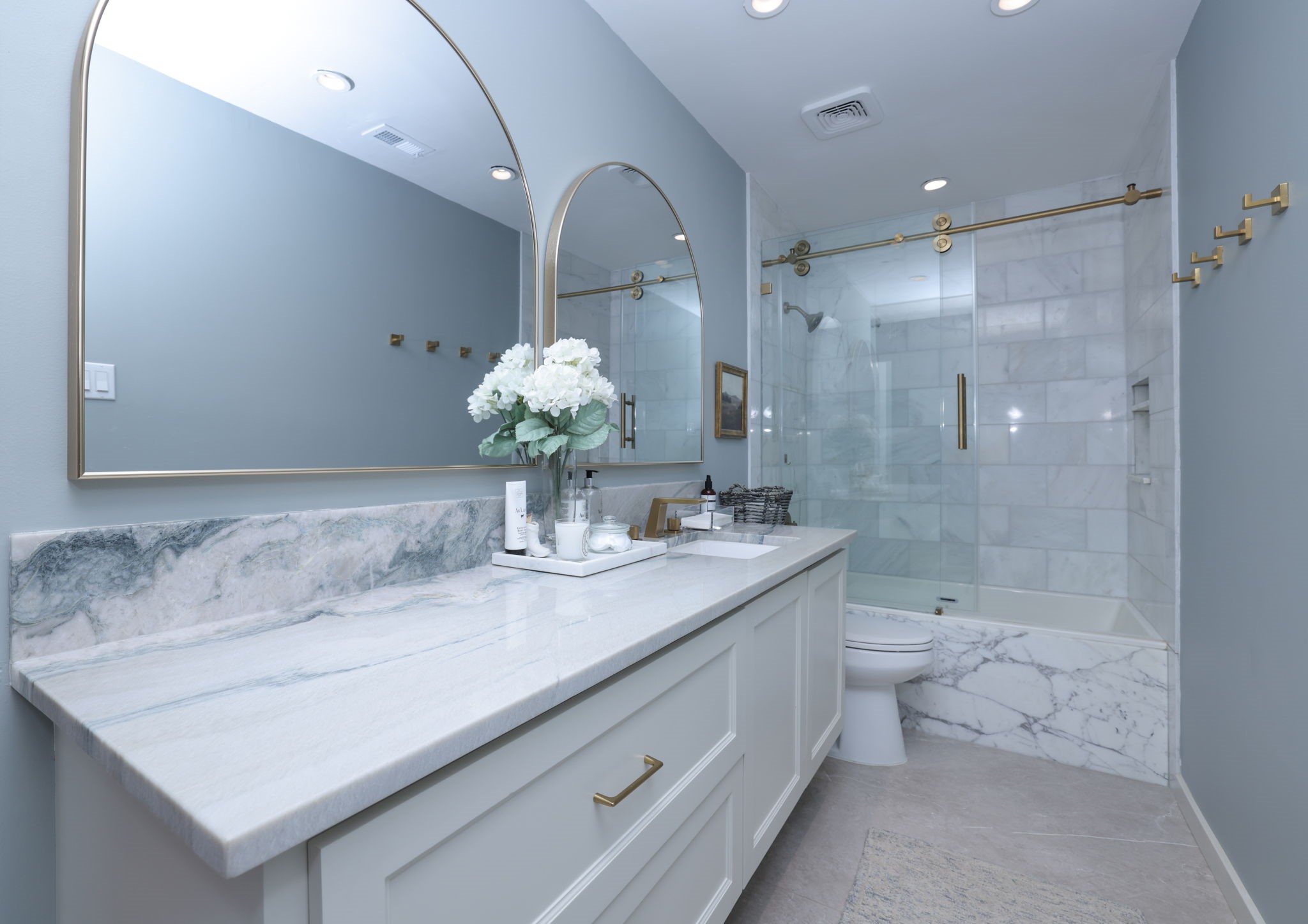 3803 Oaklace Drive Spring, TX 77389 - Photo 9 of 36 a bathroom with a granite countertop sink a toilet and shower