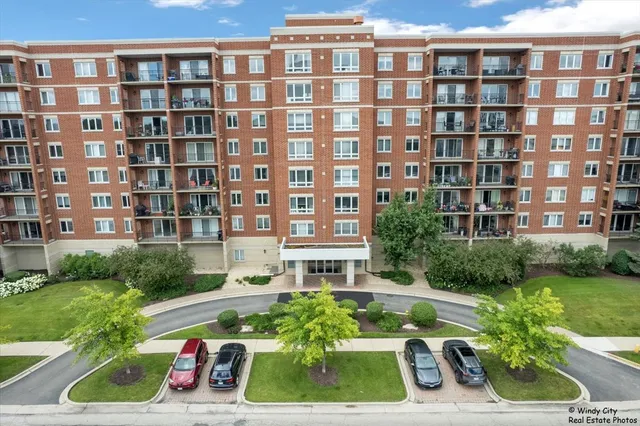 a city street lined with buildings and trees