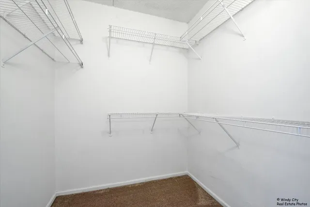 a bathroom with a double vanity sink mirror and