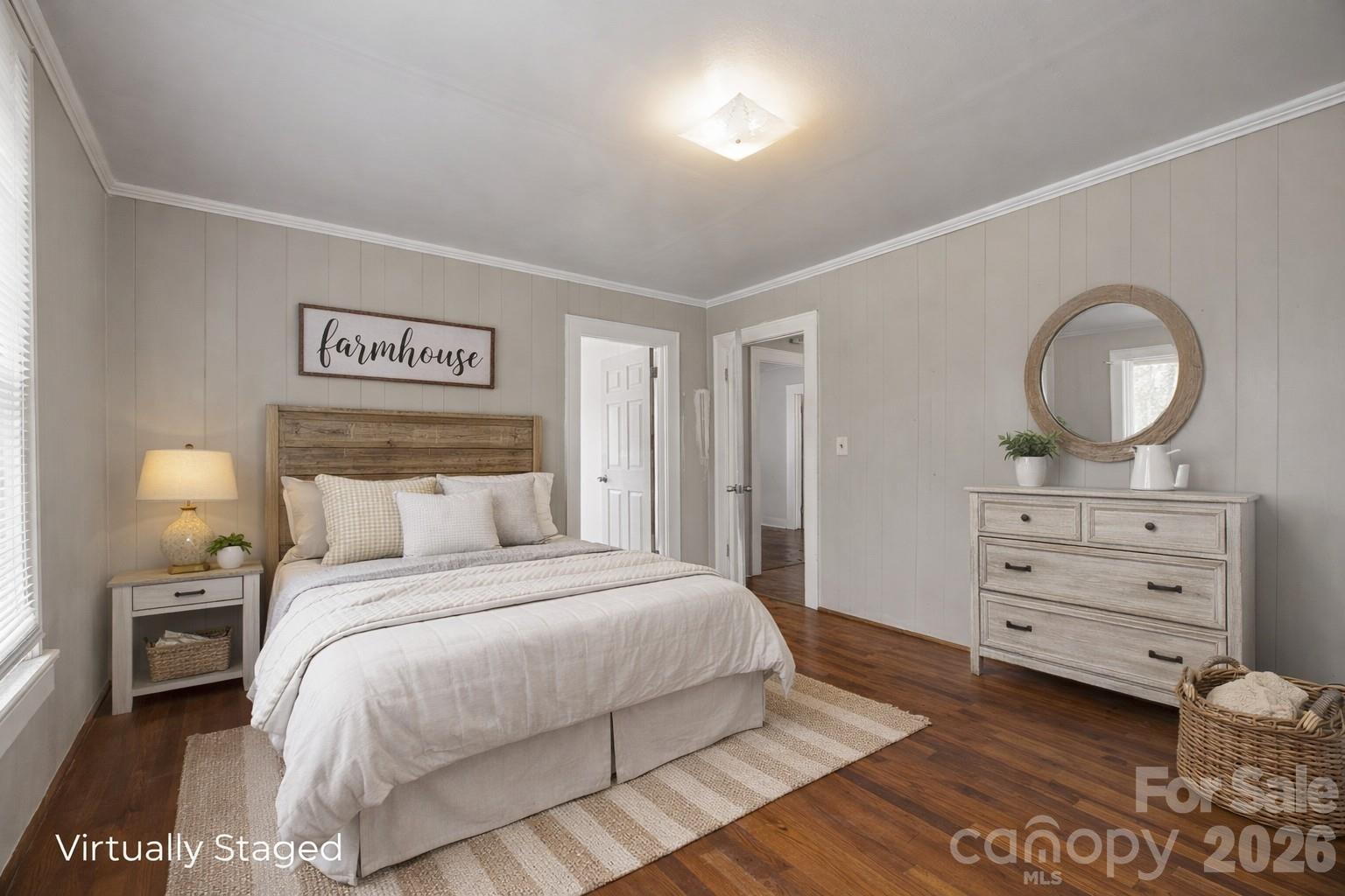 208 Ellis Street Albemarle, NC 28001 - Photo 17 of 38 a bedroom with a bed and a dresser