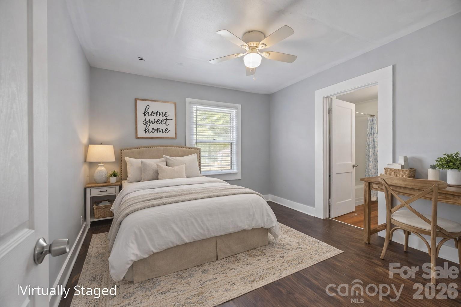 208 Ellis Street Albemarle, NC 28001 - Photo 22 of 38 a bedroom with a bed and a table in it