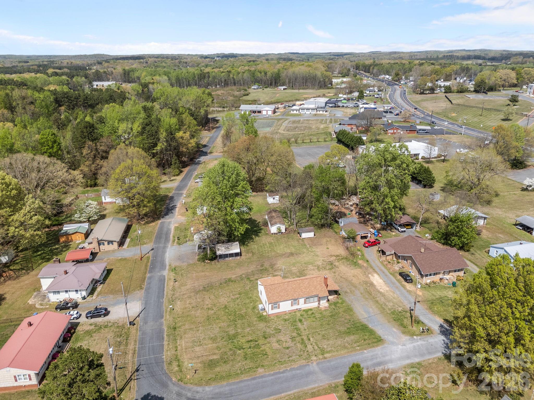 208 Ellis Street Albemarle, NC 28001 - Photo 32 of 38 an aerial view of residential houses with outdoor space
