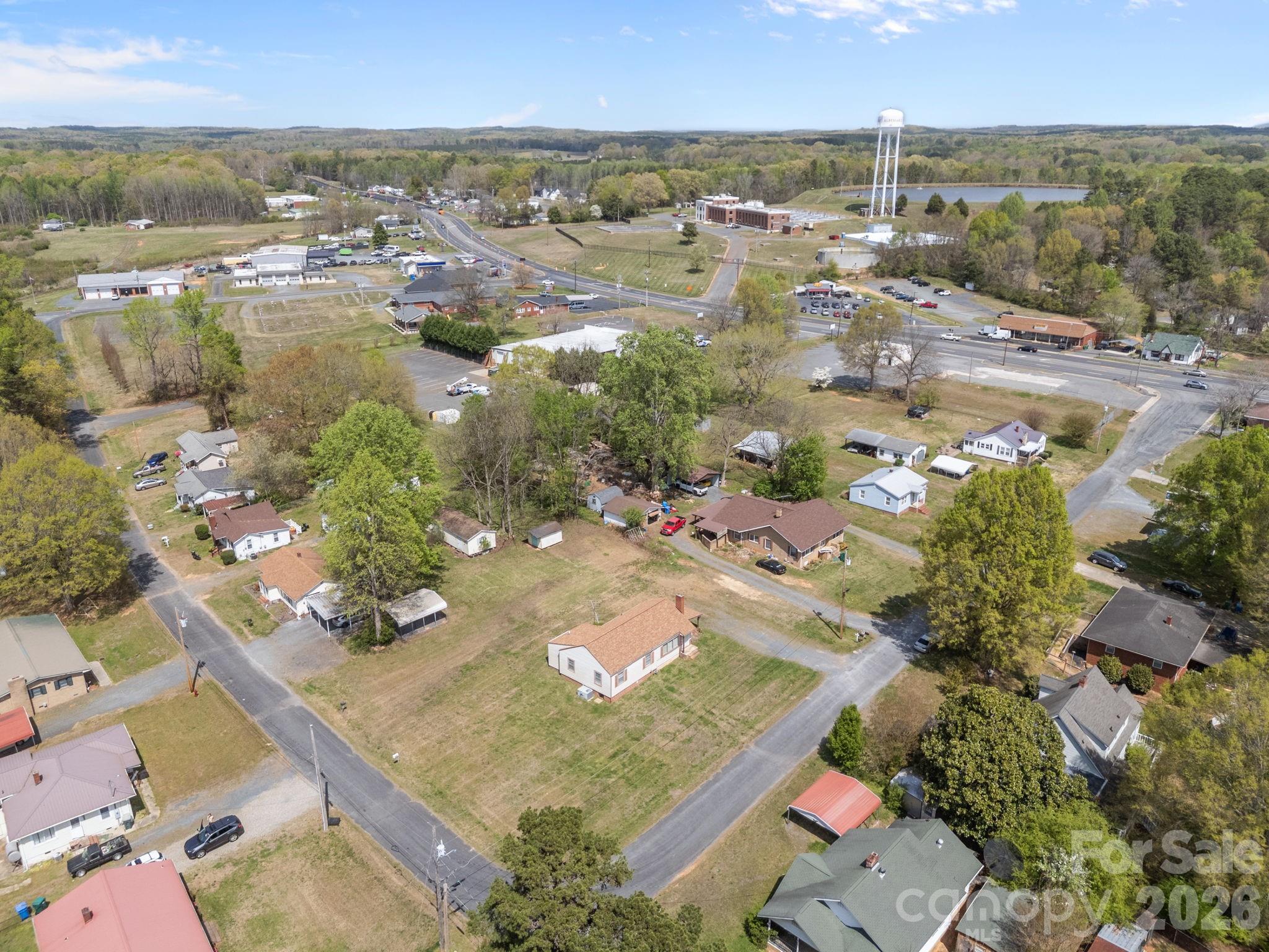 208 Ellis Street Albemarle, NC 28001 - Photo 33 of 38 an aerial view of residential houses with outdoor space