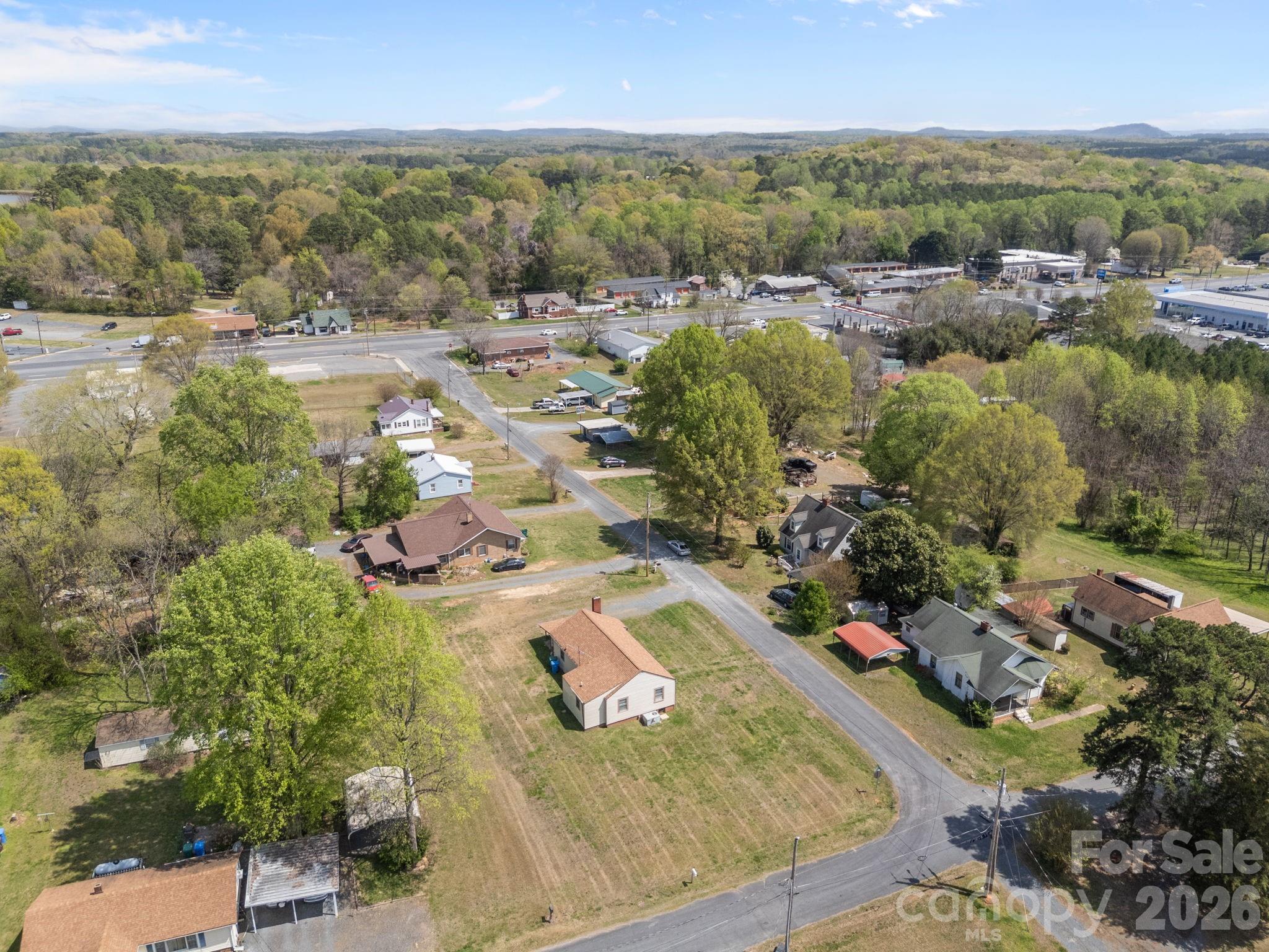 208 Ellis Street Albemarle, NC 28001 - Photo 35 of 38 an aerial view of residential houses with outdoor space