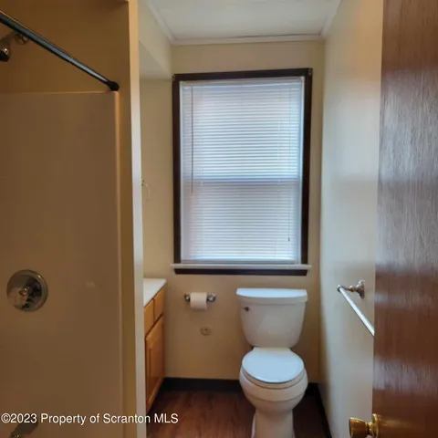 a bathroom with a toilet
