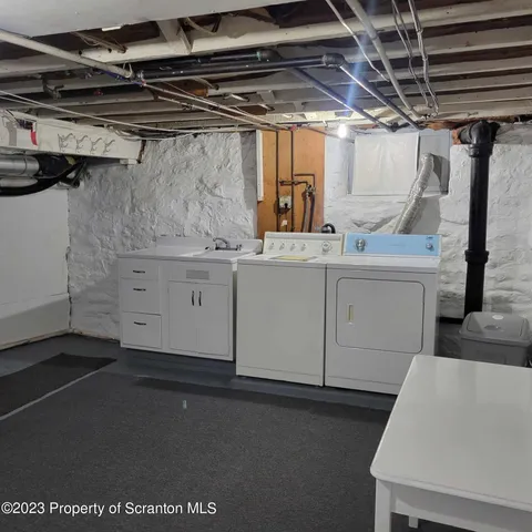 a view of storage and utility room