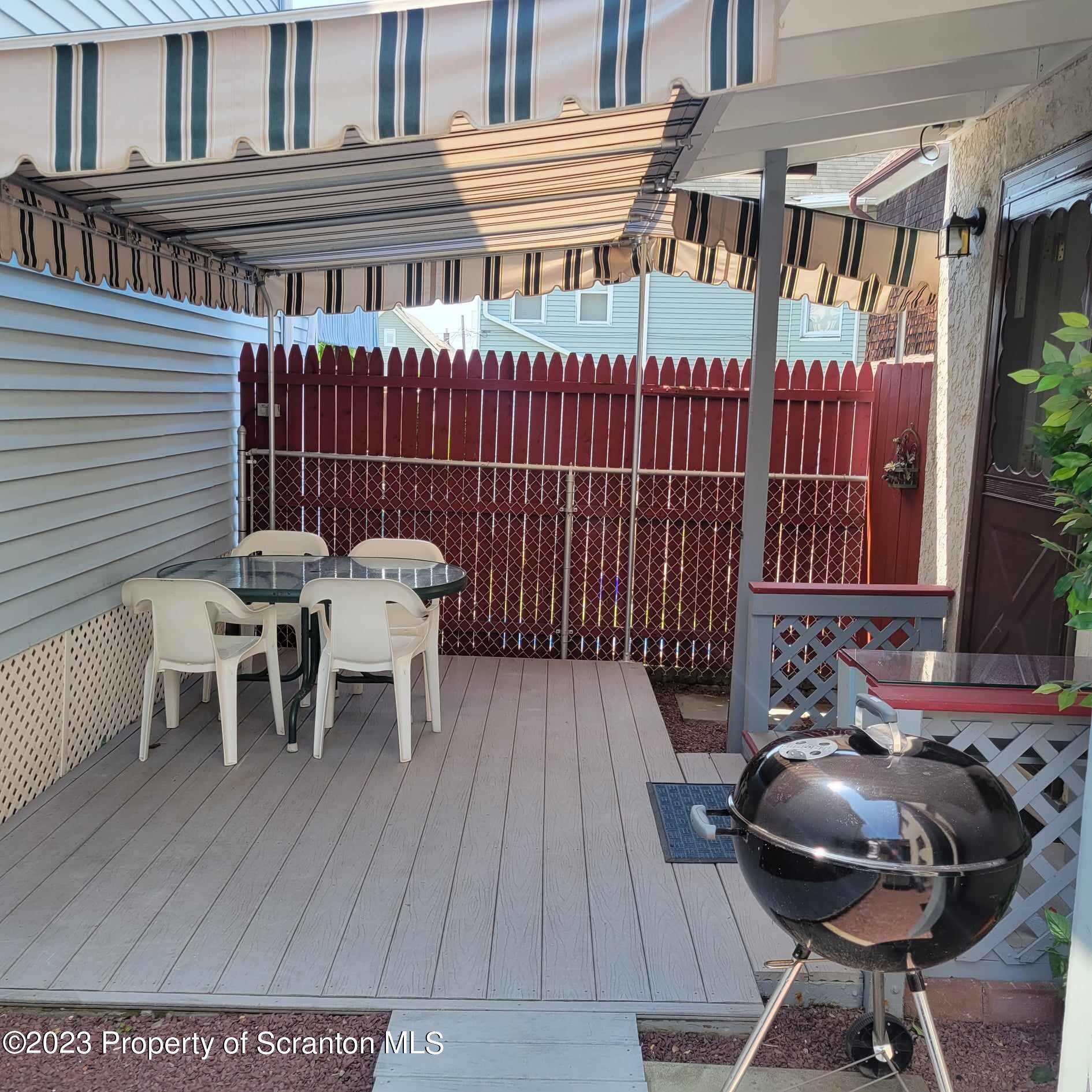 648 Prescott Avenue Scranton, PA 18510 - Photo 25 of 25 a view of a chairs and table in the patio
