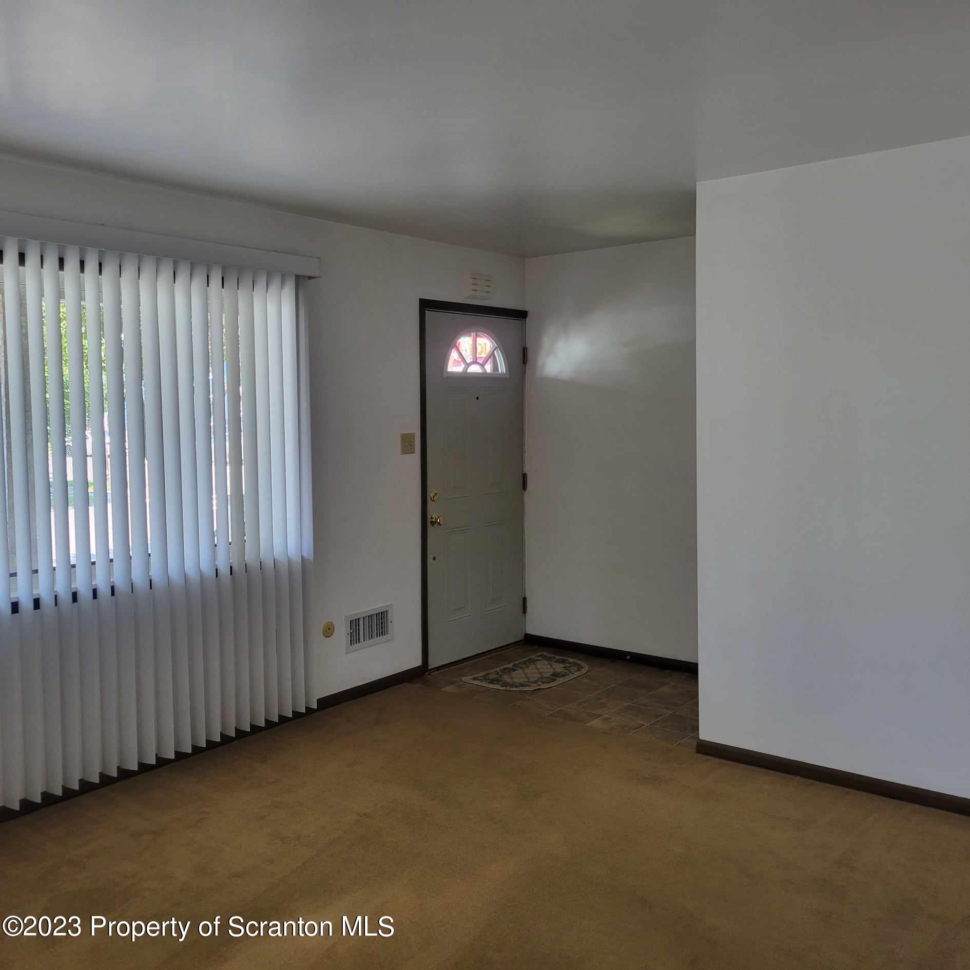648 Prescott Avenue Scranton, PA 18510 - Photo 5 of 25 an empty room with windows