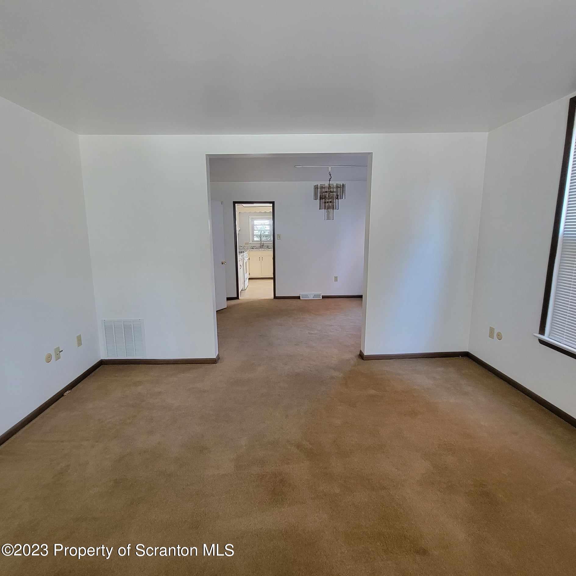 648 Prescott Avenue Scranton, PA 18510 - Photo 7 of 25 an empty room with windows