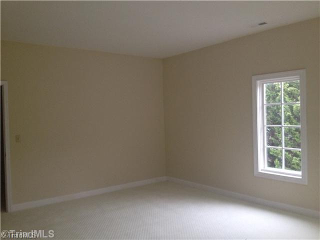 5006 Leadenhall Road Oak Ridge, NC 27310 - Photo 9 of 10 Playroom.