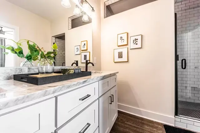 a bathroom with a sink and a mirror