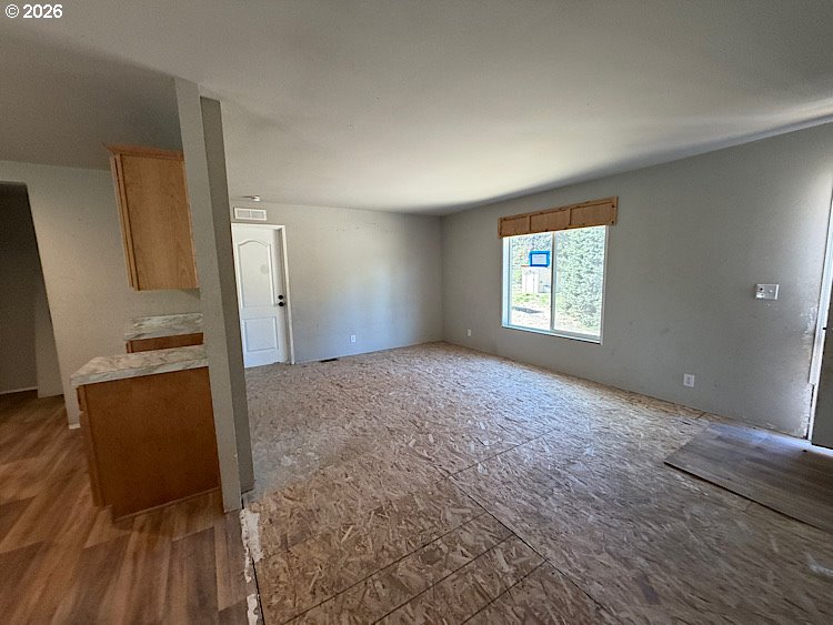 16125 Hawks Lair Road La Pine, OR 97739 - Photo 34 of 35 wooden floor in an empty room