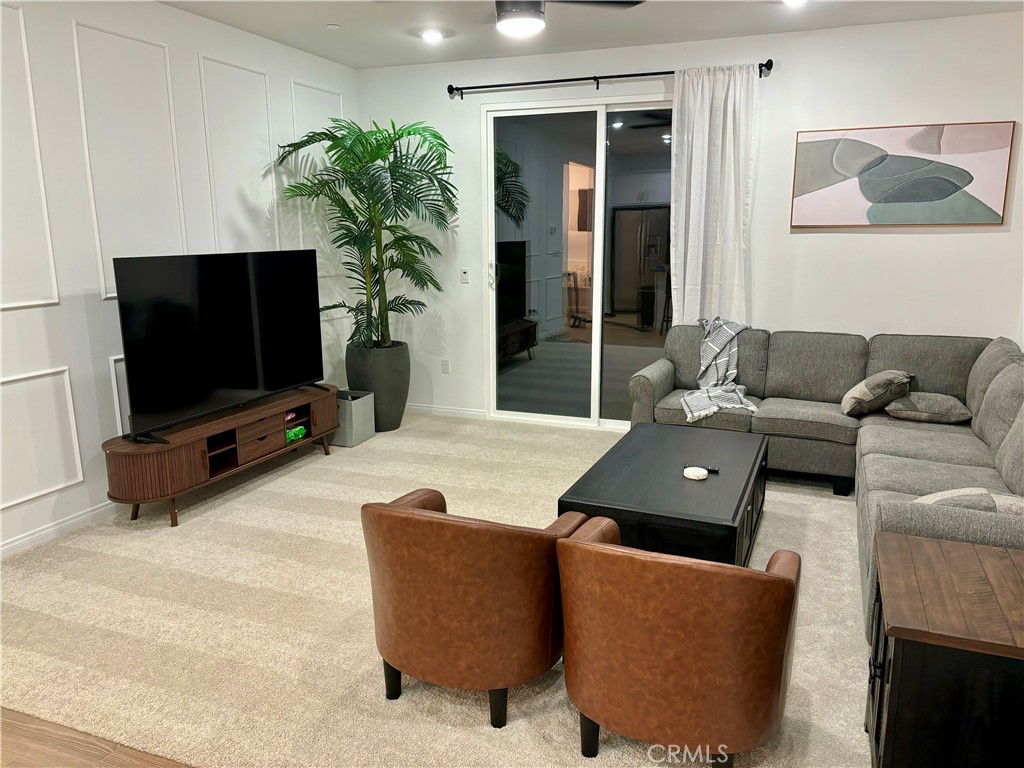 1375 Yeager Avenue Rialto, CA 92376 - Photo 4 of 12 a living room with furniture and a flat screen tv