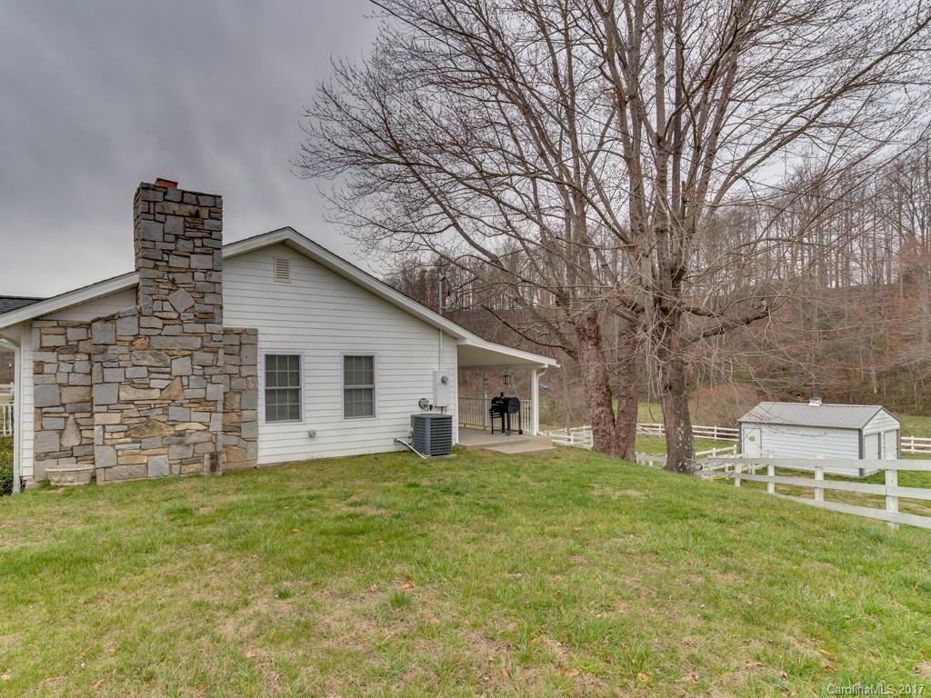 4361 Chimney Rock Road Hendersonville, NC 28792 - Photo 11 of 19 a view of a house with a yard