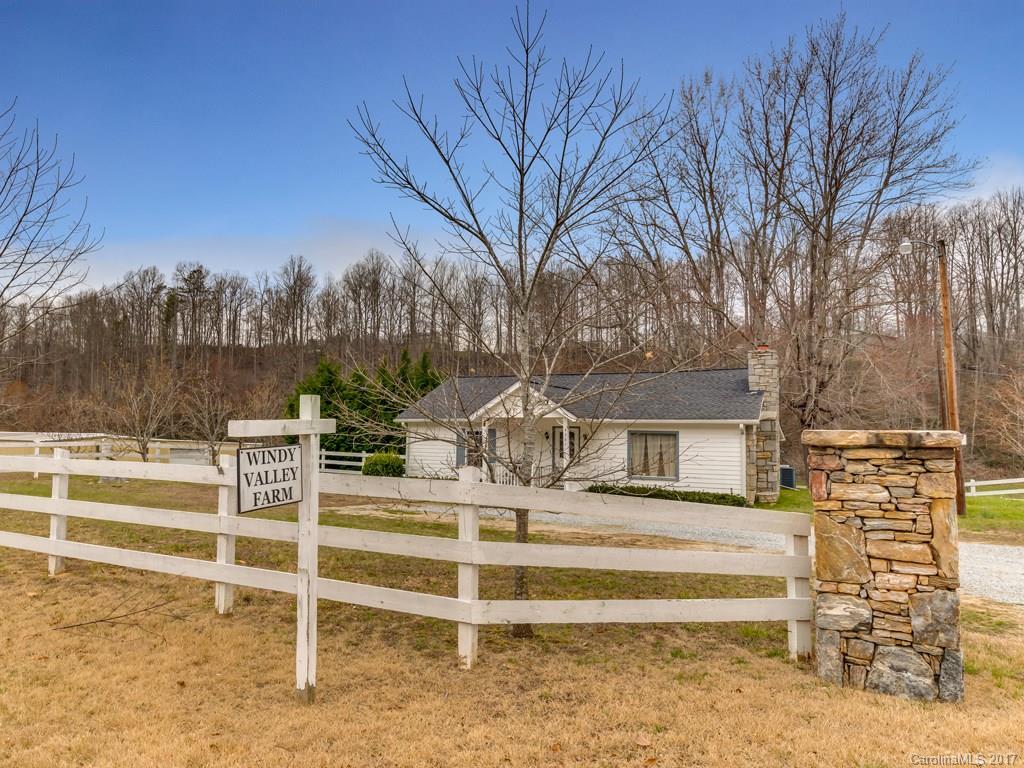 4361 Chimney Rock Road Hendersonville, NC 28792 - Photo 13 of 19 a view of a house with a yard