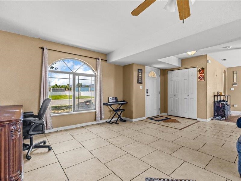 2860 B B 3/4 Road Grand Junction, CO 81503 - Photo 11 of 29 a living room with a large window and a table