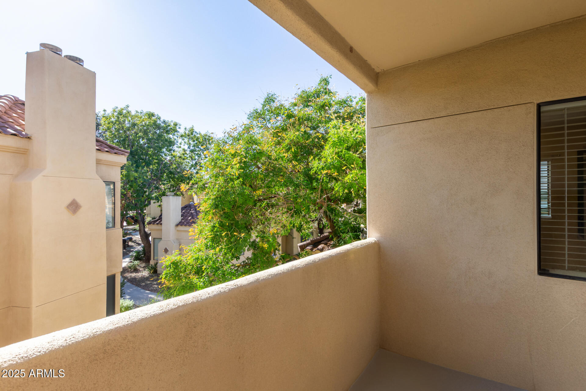 7575 East Indian Bend Road, Unit 2146 Scottsdale, AZ 85250 - Photo 19 of 40 a view of a building from a window
