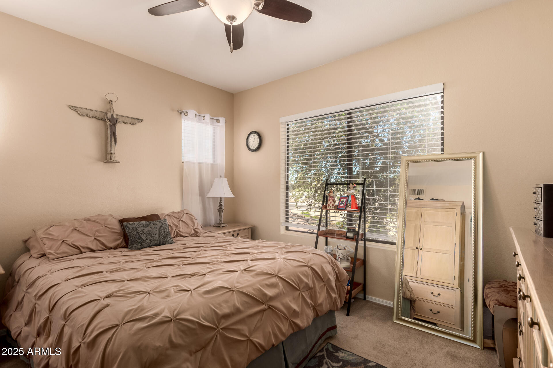 7575 East Indian Bend Road, Unit 2146 Scottsdale, AZ 85250 - Photo 24 of 40 a bedroom with a bed and a window