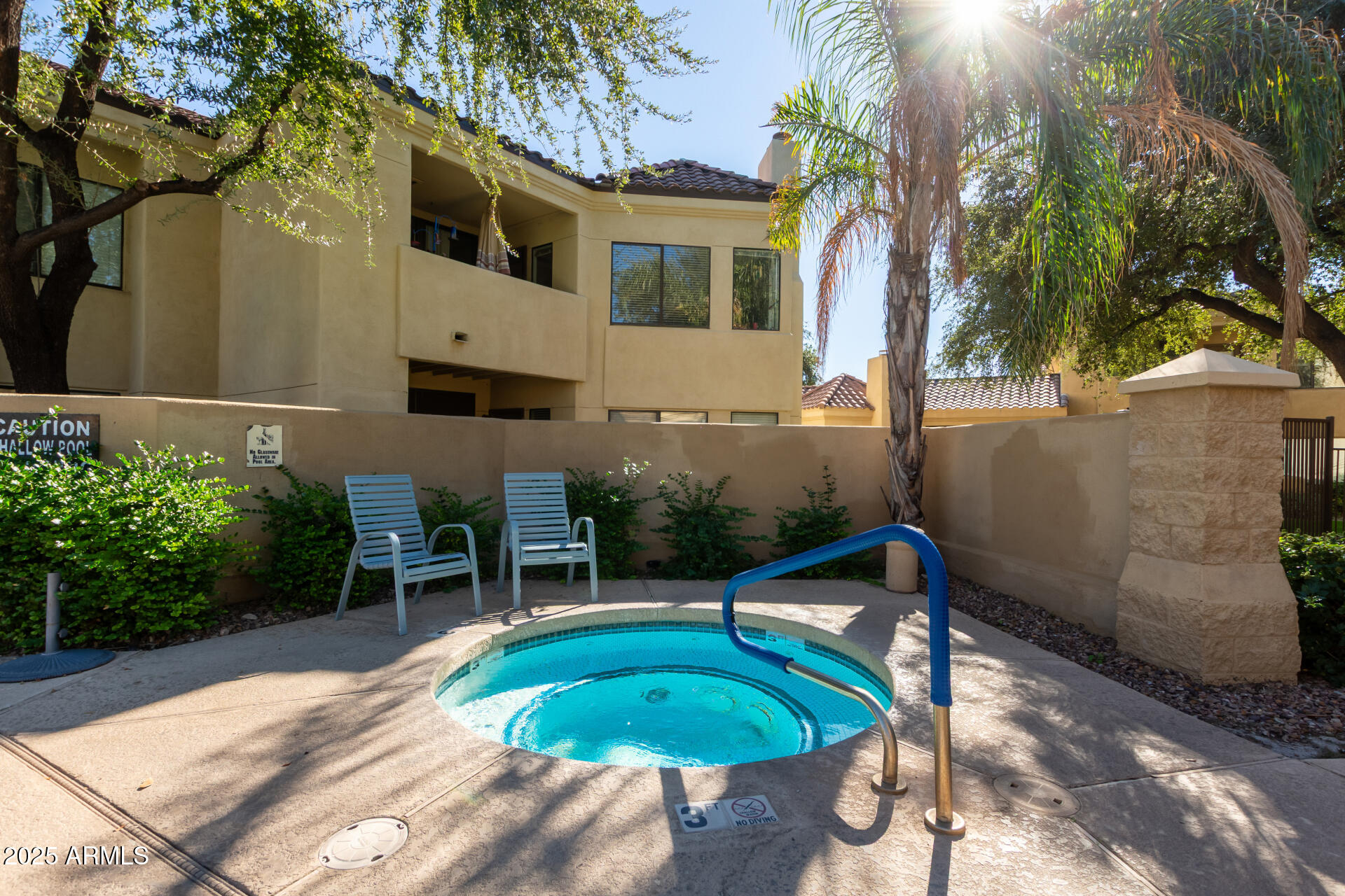 7575 East Indian Bend Road, Unit 2146 Scottsdale, AZ 85250 - Photo 3 of 40 a front view of a house with garden