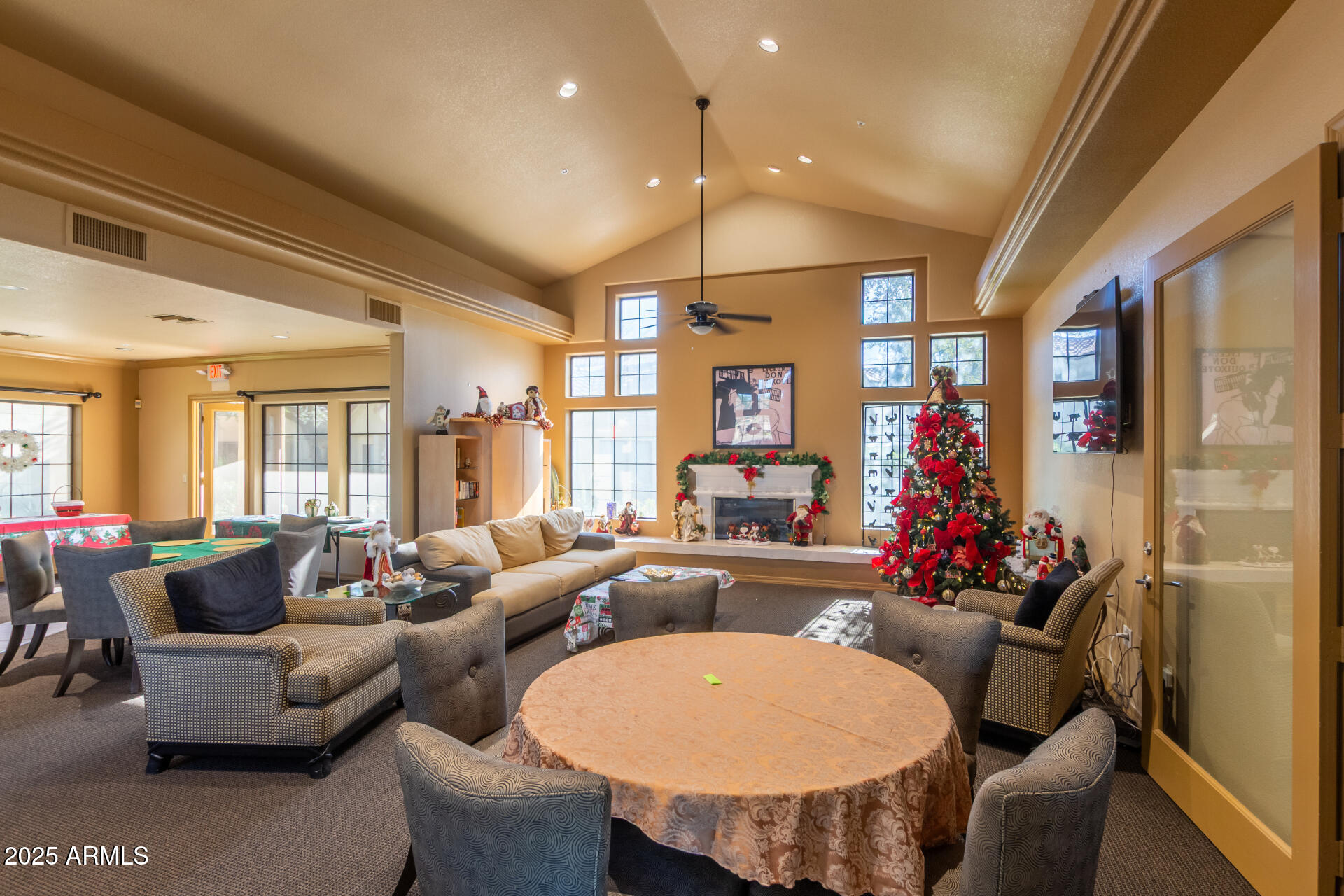 7575 East Indian Bend Road, Unit 2146 Scottsdale, AZ 85250 - Photo 35 of 40 a living room with furniture and a large window