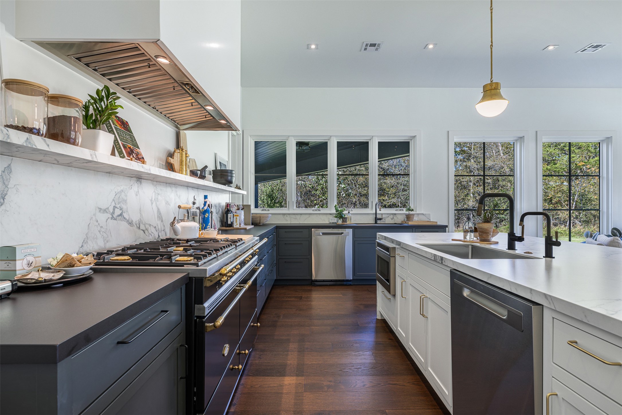 830 South Weyand Road Round Top, TX 78954 - Photo 20 of 35 a kitchen with a stove and a sink