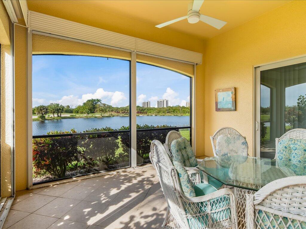 1498 Borghese Lane, Unit 101 Naples, FL 34114 - Photo 11 of 31 a roof deck with couch