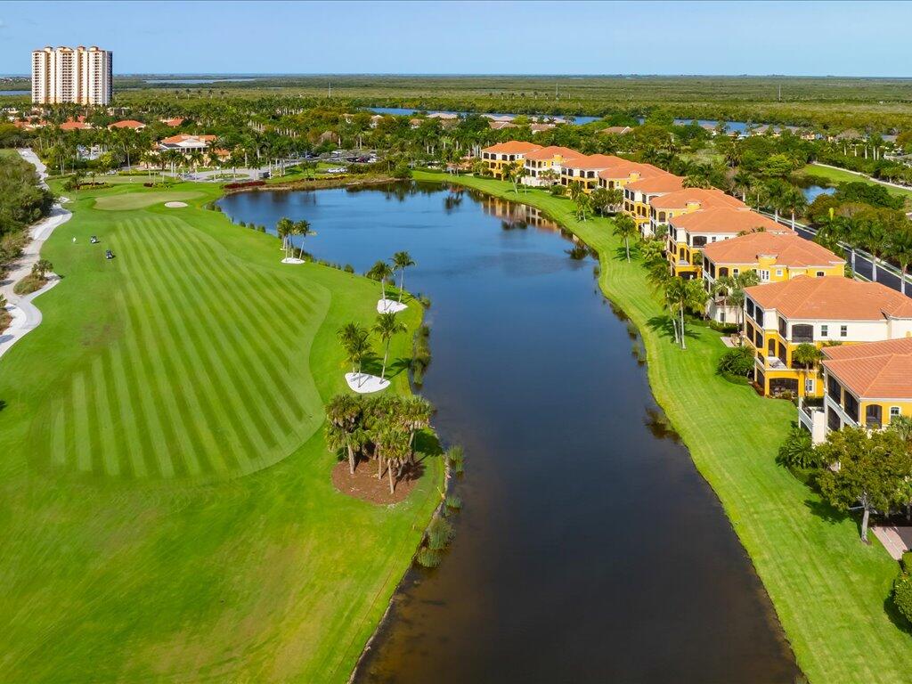 1498 Borghese Lane, Unit 101 Naples, FL 34114 - Photo 28 of 31 a view of a city and ocean view