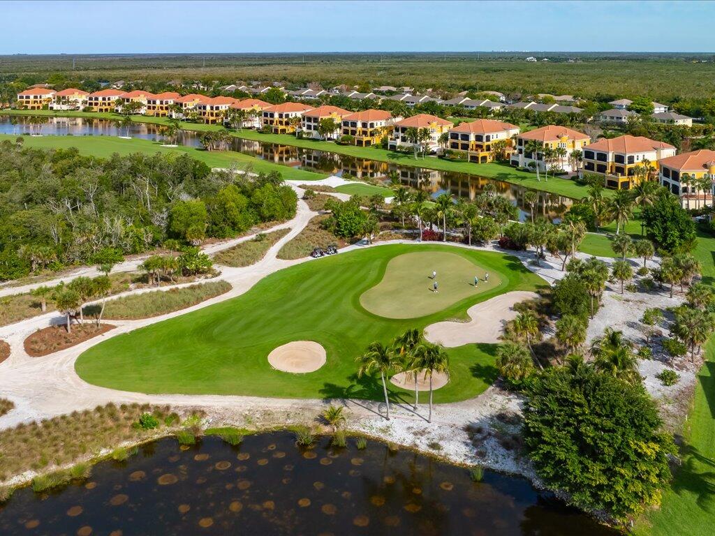 1498 Borghese Lane, Unit 101 Naples, FL 34114 - Photo 3 of 31 a view of a city