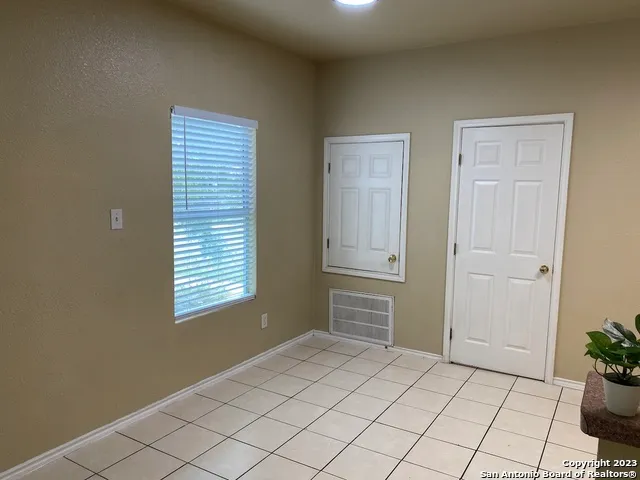 a kitchen with stainless steel appliances granite countertop a stove a refrigerator a sink and dishwasher