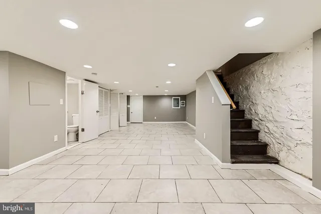 a view of an entryway with a staircase