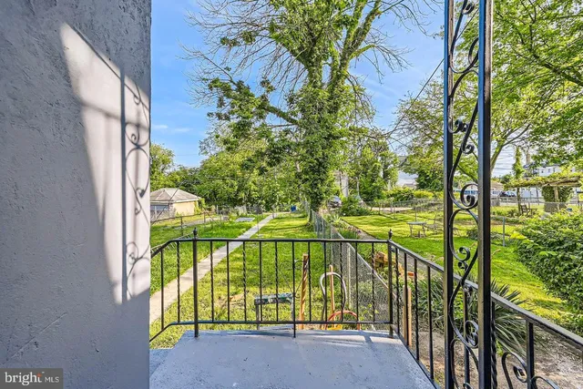 a view of swimming pool from a balcony