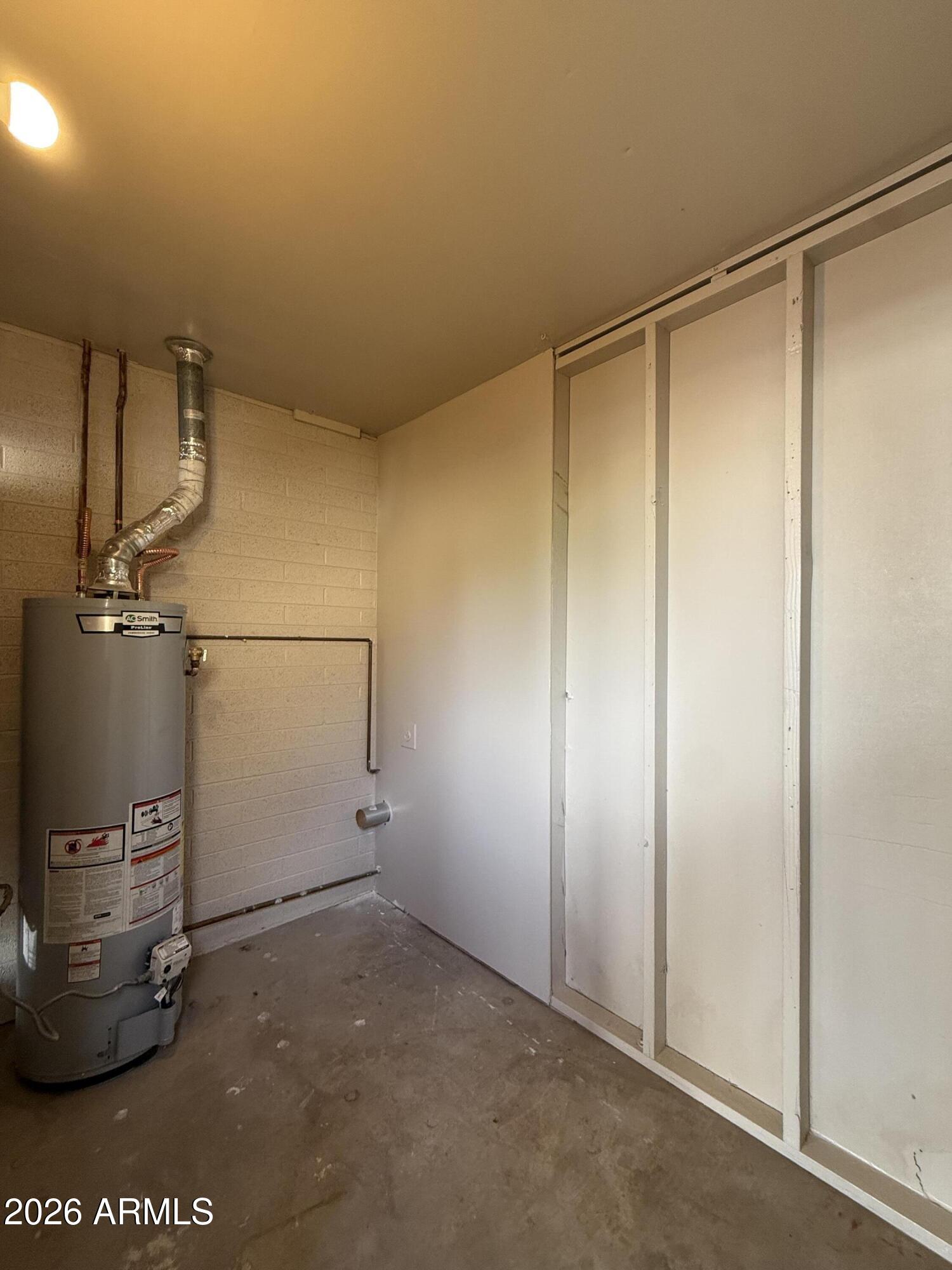 5807 West Flower Street Phoenix, AZ 85031 - Photo 11 of 11 a view of a room with rack on the wall