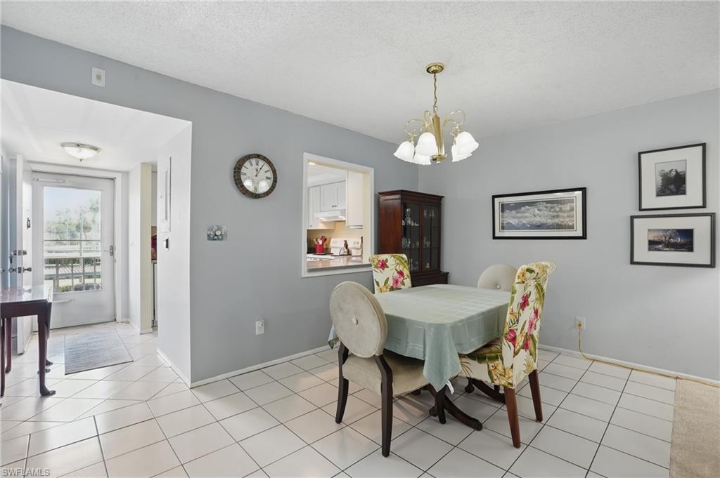 5467 Rattlesnake Hamm Road, Unit C204 Naples, FL 34113 - Photo 8 of 19 REAR SCREENED LANAI