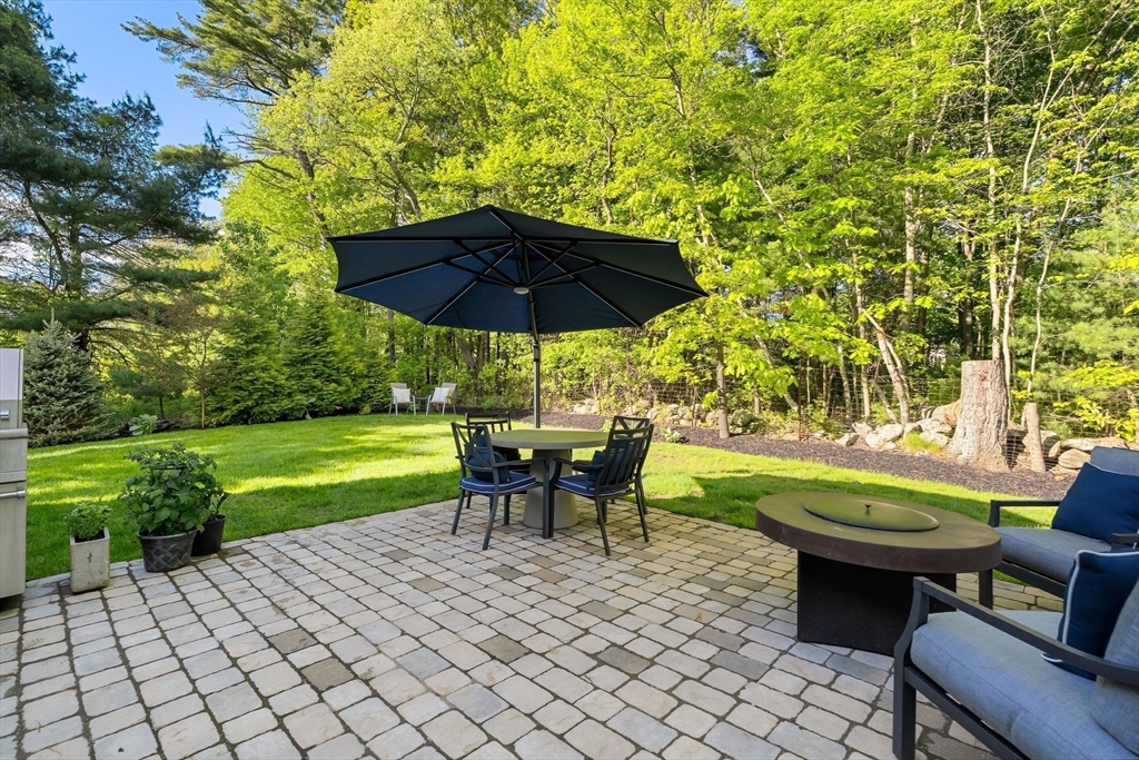 2 Hummingbird Way, Unit 1 Methuen, MA 01844 - Photo 35 of 42 a view of a swimming pool and lounge chairs