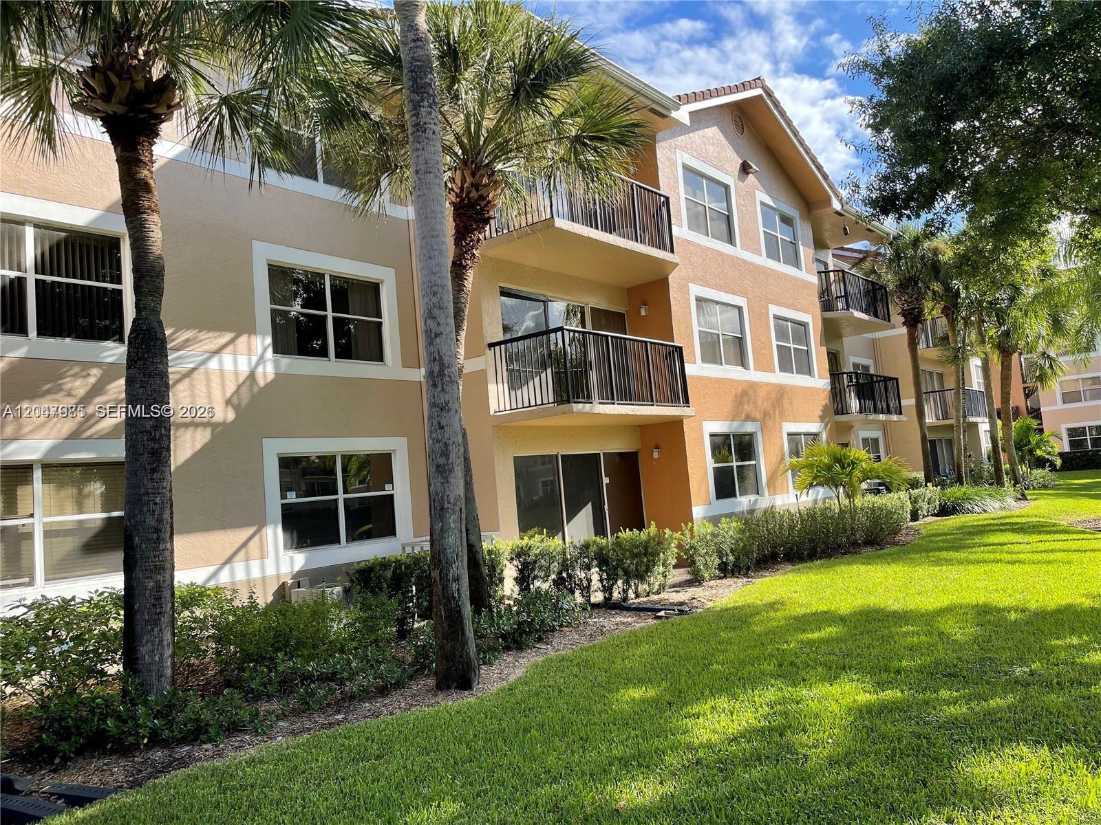 9033 Wiles Road, Unit 206 Coral Springs, FL 33067 - Photo 2 of 23