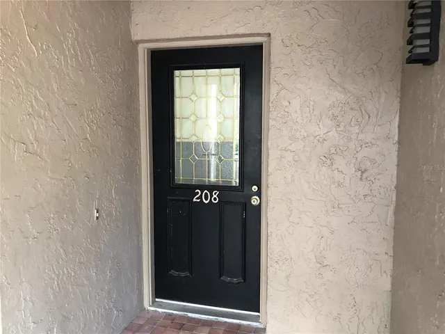 a view of gallery with wooden floor