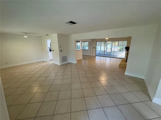 a view of an empty room and window