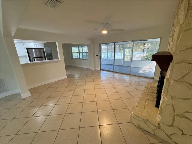 a view of an empty room and window