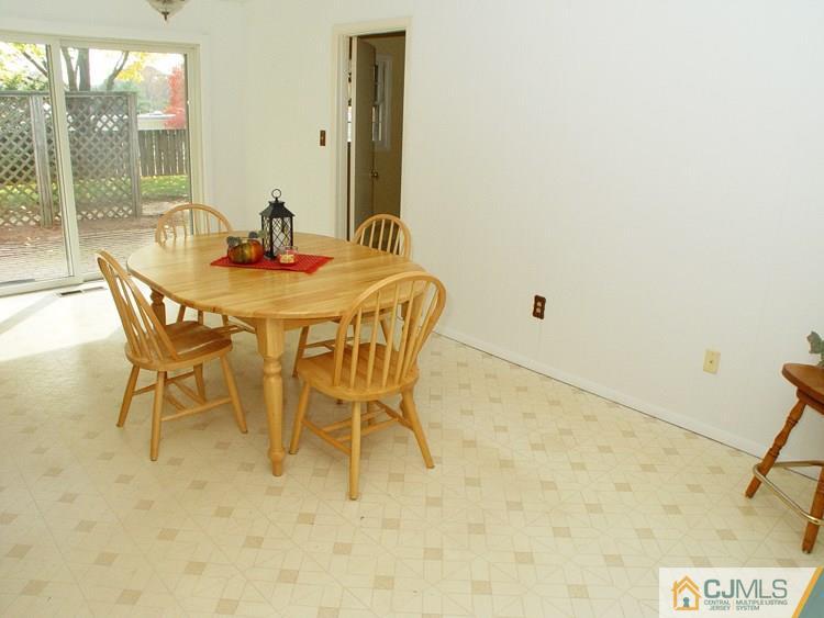 124 Drake Road Somerset, NJ 08873 - Photo 8 of 24 a dining room with furniture and window