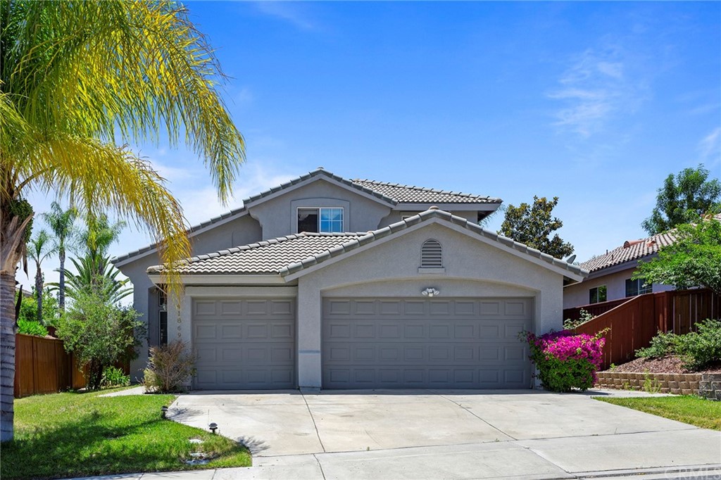 41869 Niblick Road Temecula, CA 92591 - Photo 1 of 1 a front view of a house with a yard