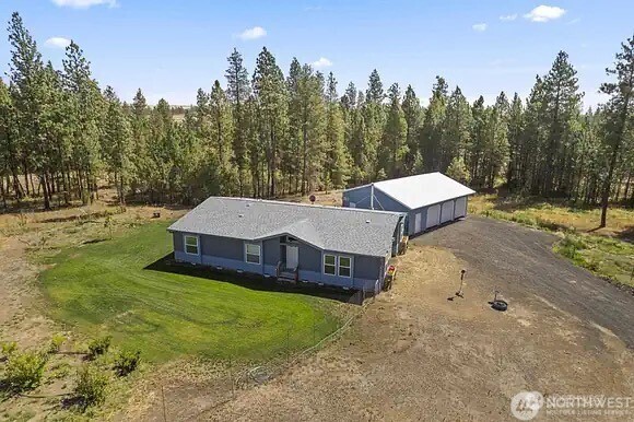 200 Lot C Fineview Chehalis, WA 98532 - Photo 1 of 31 a view of a house with a yard and sitting area
